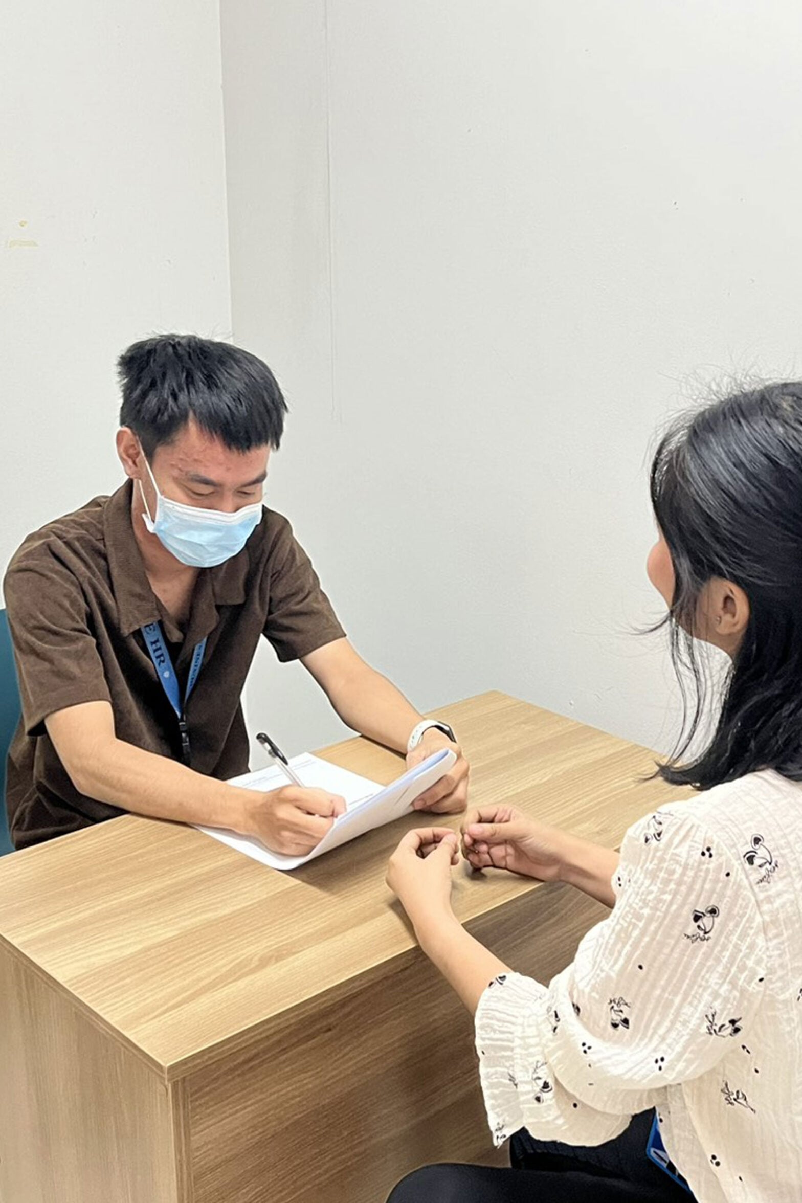 A candidate speaking with an interviewer